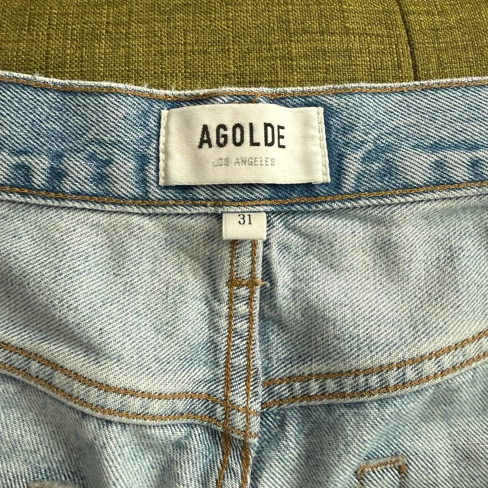 Agolde Light Blue Distressed Denim Shorts